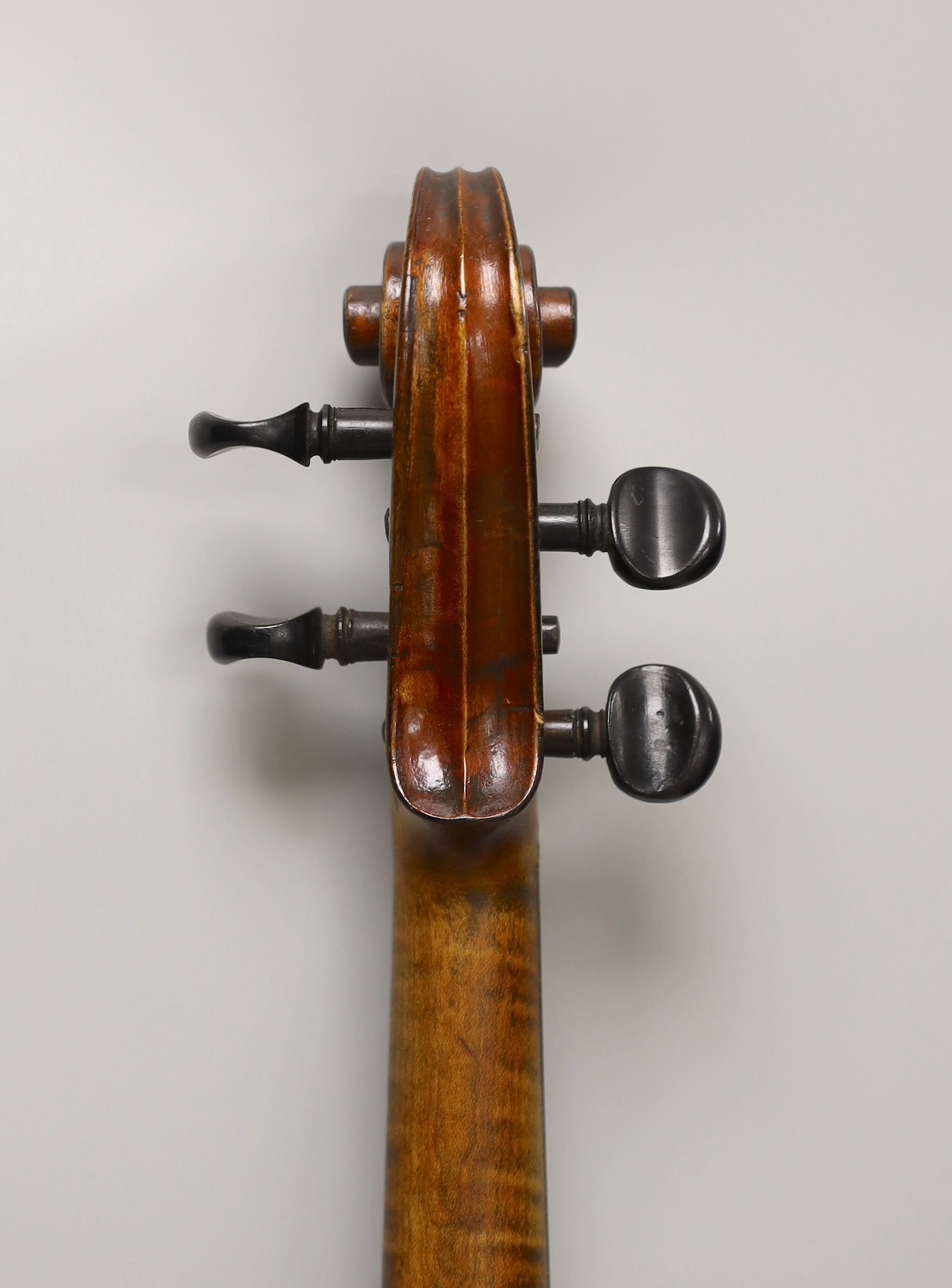 A cased French double backed violin, interior label reads ‘Copie de J.B. Vuillaume à Paris.’ Back measures 36cm excluding button